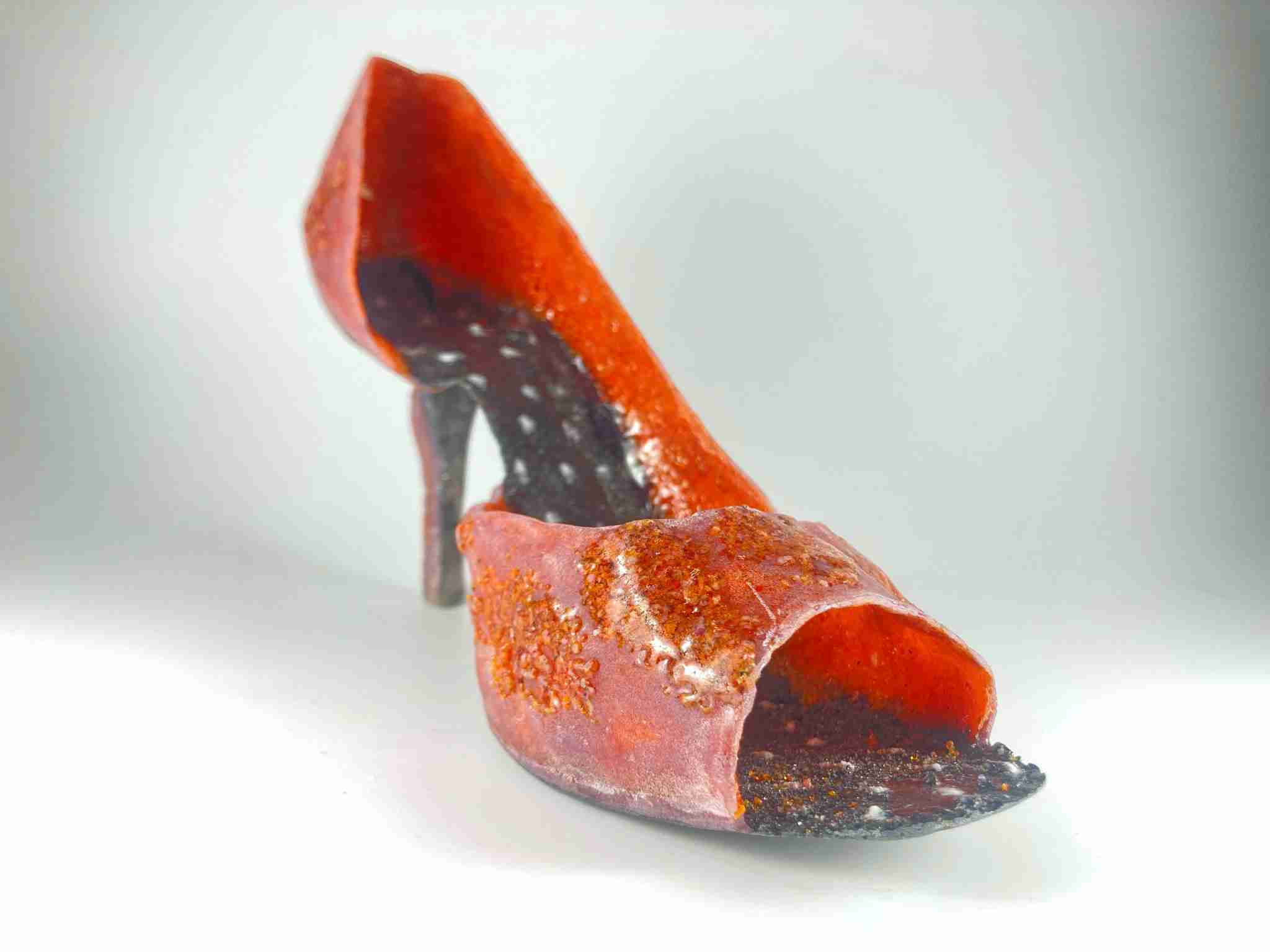 Orange-pink high heel with polkadots