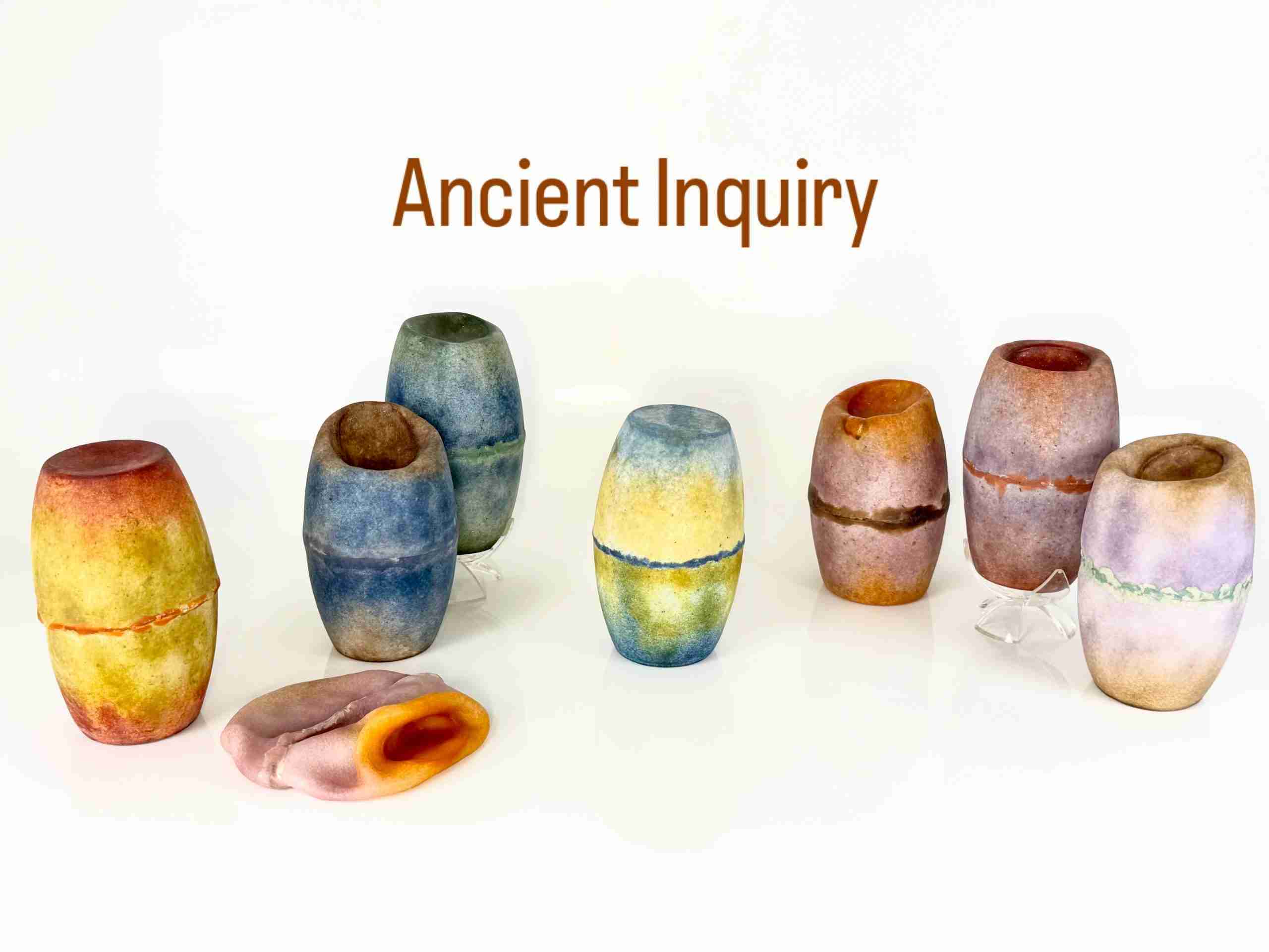 set of 8 vessels, one slumped in bright colors