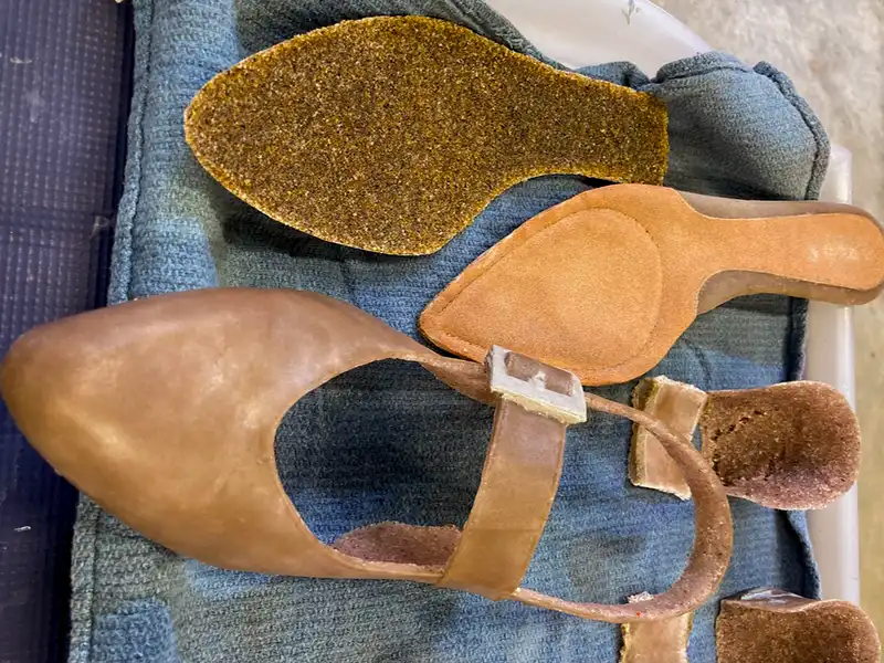 individual parts of a shoe in tan